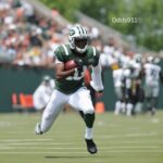 New York Jets wide receiver in action, analyzed by Tommy Mac, sports analyst with 30+ years of experience at Odds911